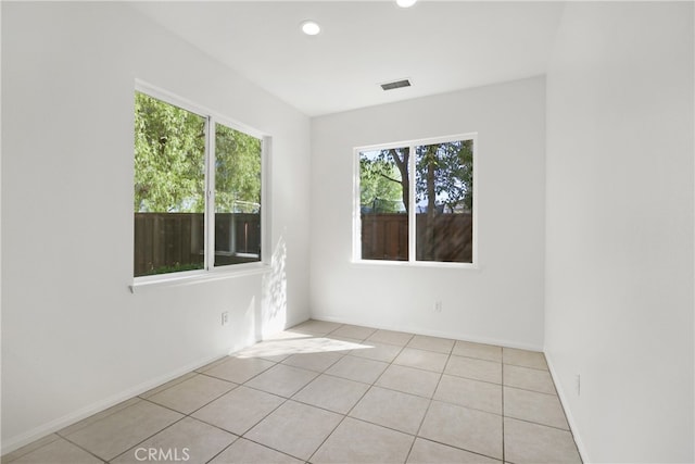 view of tiled spare room