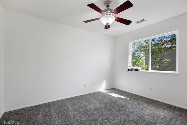 empty room with carpet flooring and ceiling fan