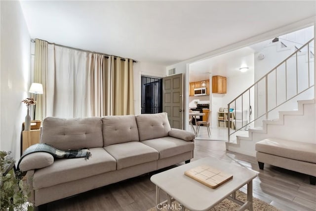 living room featuring wood-type flooring