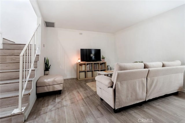 living room featuring hardwood / wood-style flooring