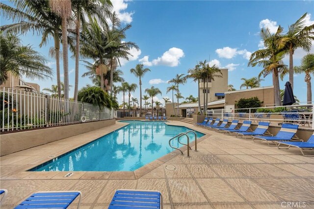 view of swimming pool with a patio