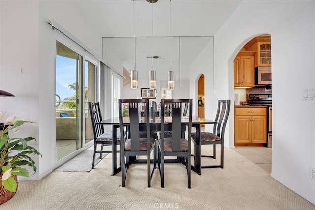 view of carpeted dining space