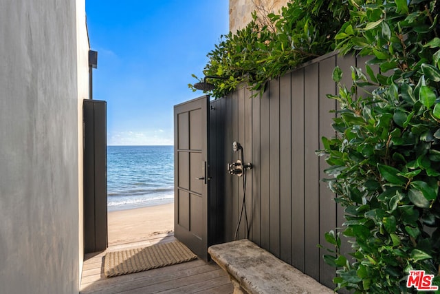 exterior space featuring a beach view