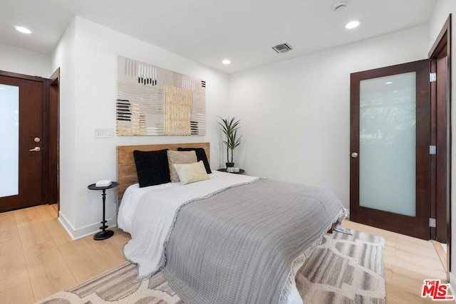 bedroom featuring light hardwood / wood-style floors