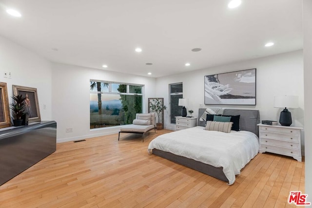 bedroom featuring light hardwood / wood-style floors