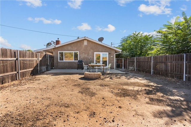 back of property with a patio area