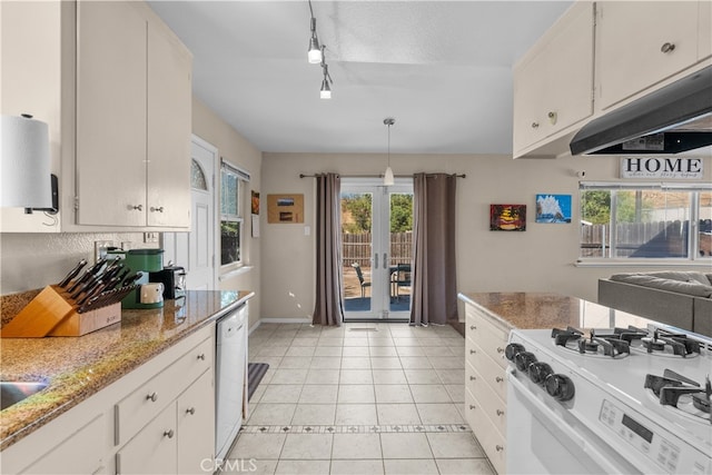 kitchen with white cabinets, white appliances, light tile patterned flooring, pendant lighting, and track lighting