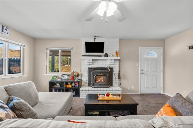 living room featuring ceiling fan and carpet flooring