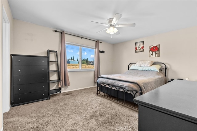 bedroom featuring ceiling fan and carpet flooring