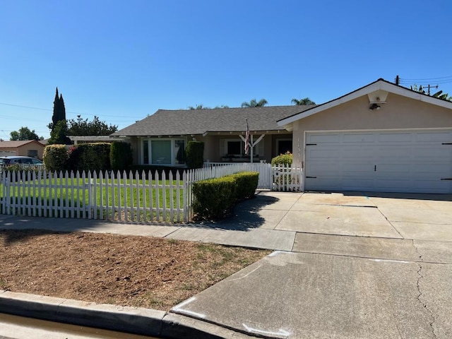 ranch-style home featuring a garage and a front yard