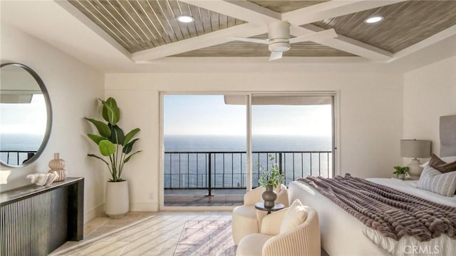 bedroom featuring beamed ceiling, access to outside, a water view, and ceiling fan