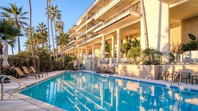 view of pool featuring a patio