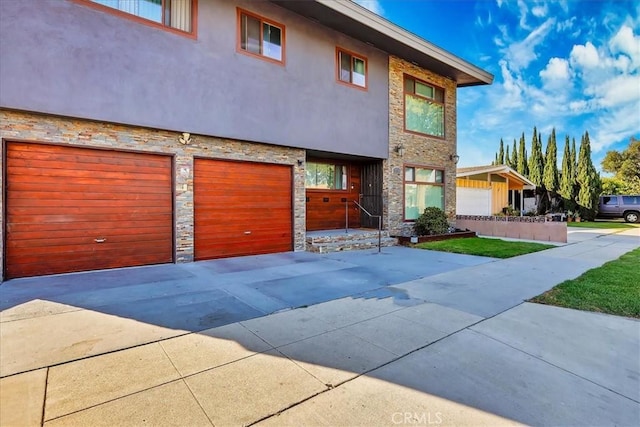 view of front of property with a garage