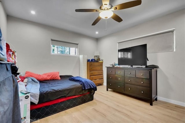 bedroom featuring ceiling fan and light wood-type flooring