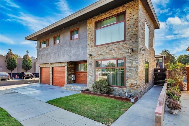 view of front of home with a garage