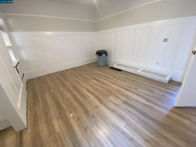 empty room with light hardwood / wood-style floors