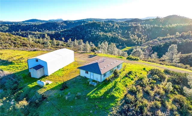 drone / aerial view featuring a mountain view