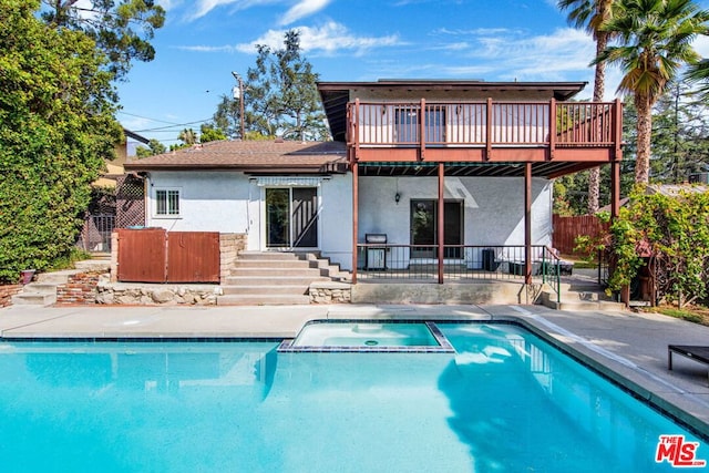 back of house with a patio area