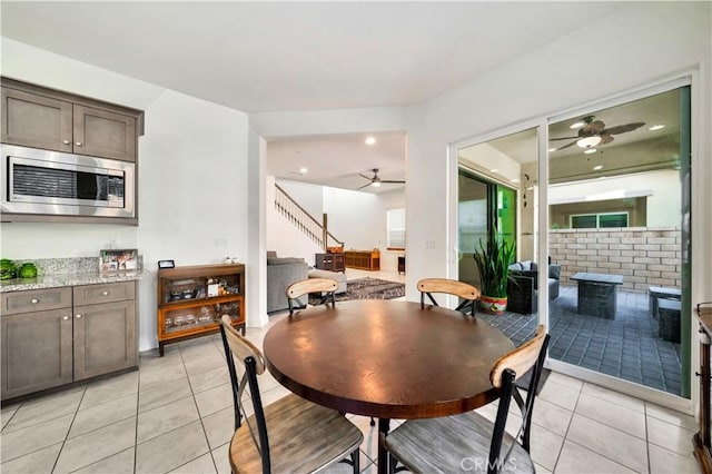 dining room featuring light tile patterned floors