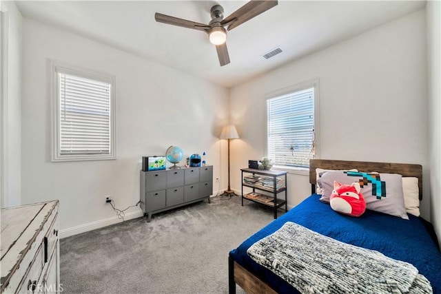 carpeted bedroom with ceiling fan