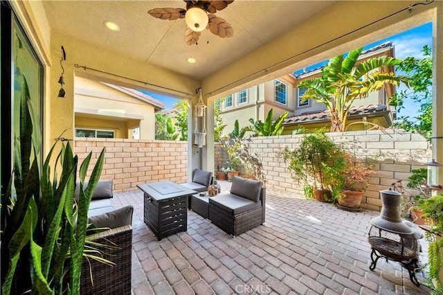 view of patio featuring outdoor lounge area and ceiling fan