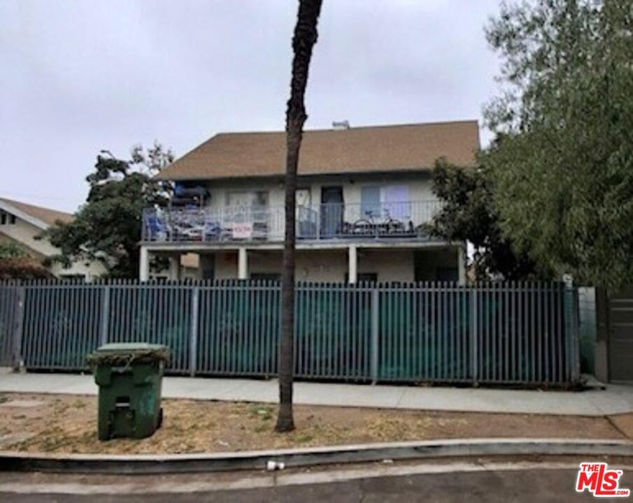 view of front of home with a balcony