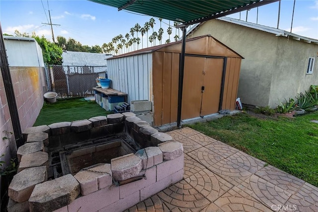 view of outbuilding with a yard