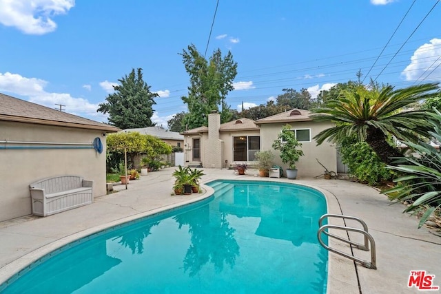 view of pool with a patio area