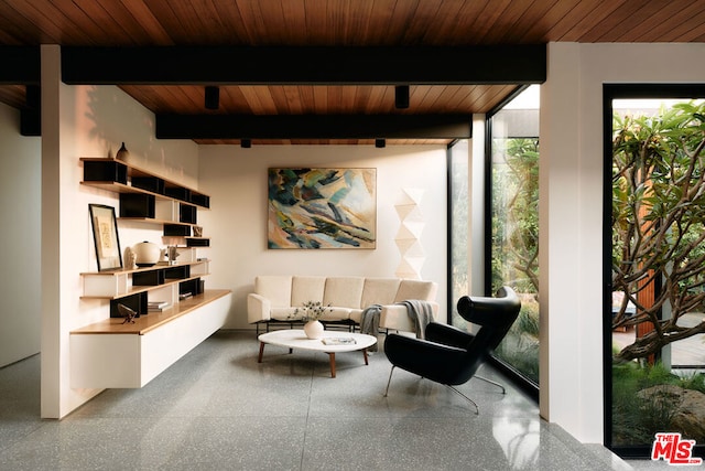 living room with beamed ceiling, floor to ceiling windows, and wooden ceiling