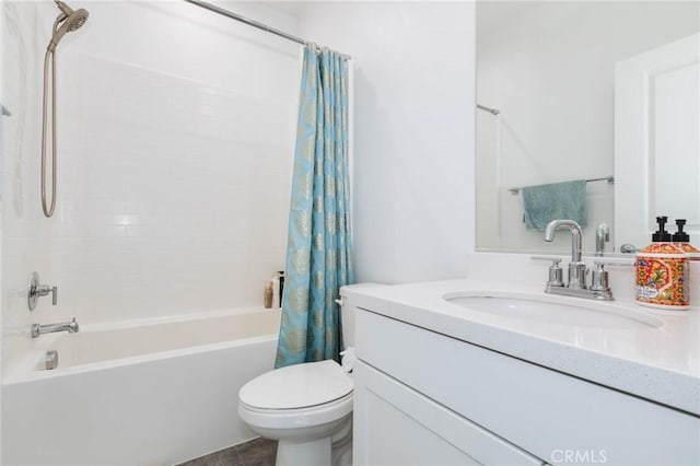 full bathroom featuring tile patterned flooring, vanity, shower / tub combo, and toilet