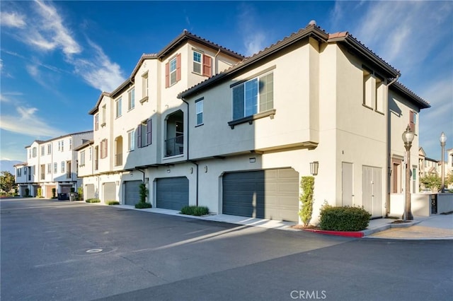 view of building exterior with a garage