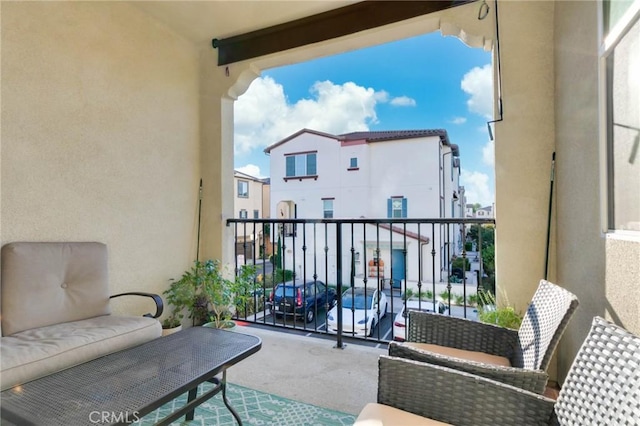 balcony with an outdoor hangout area