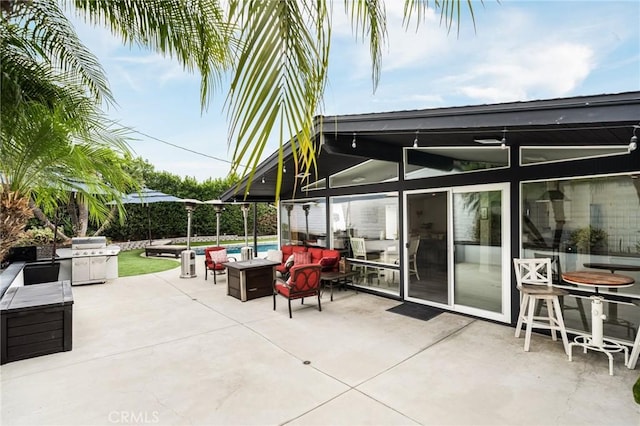 view of patio / terrace featuring an outdoor living space and area for grilling