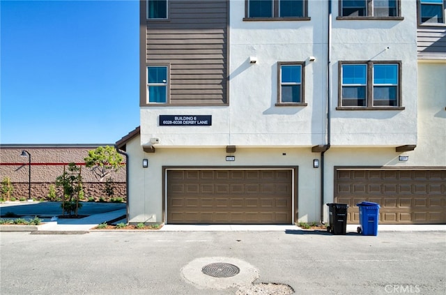 view of property featuring a garage