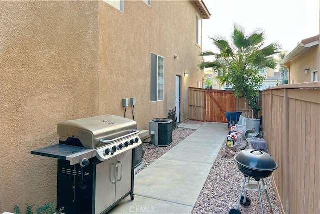 view of patio / terrace featuring grilling area and central AC