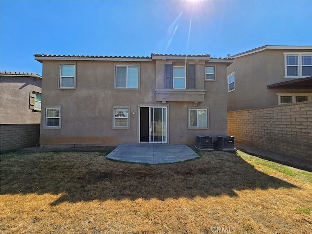 37515 Ruby Red Ln, Palmdale, CA 93551 - rear view of property with stucco siding, a patio area, and central air condition unit