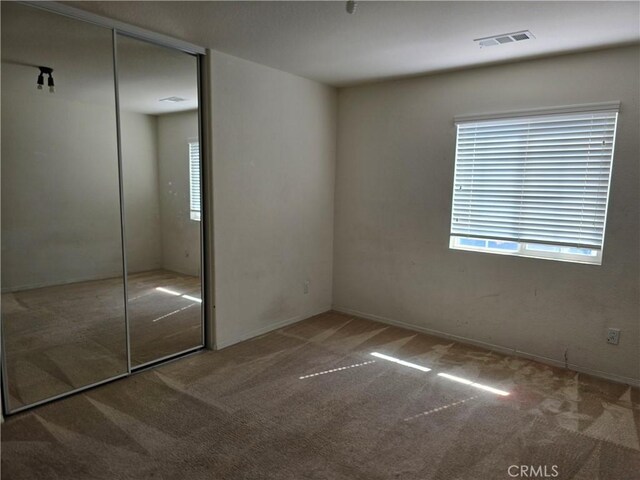 37515 Ruby Red Ln, Palmdale, CA 93551 - unfurnished bedroom with carpet flooring and a closet