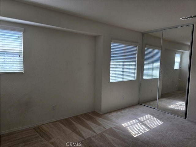 37515 Ruby Red Ln, Palmdale, CA 93551 - unfurnished bedroom with carpet and a closet