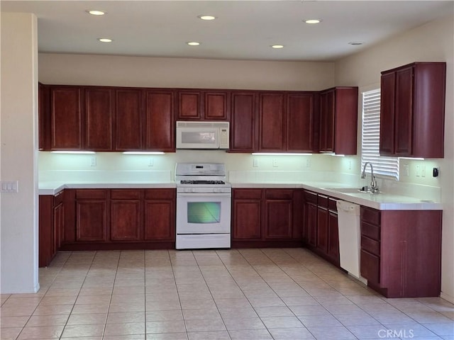 37515 Ruby Red Ln, Palmdale, CA 93551 - kitchen with white appliances, a sink, light countertops, recessed lighting, and light tile patterned floors