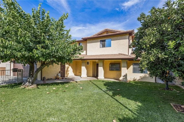 view of front of property with a front lawn