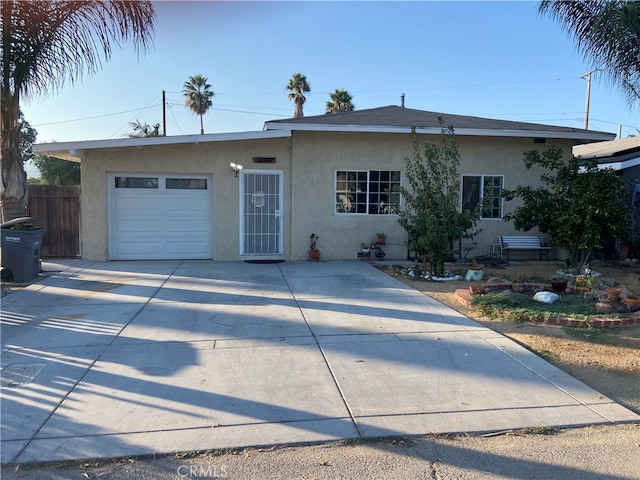 single story home featuring a garage