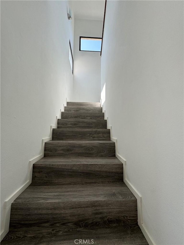 4812 E Seldner Ave, Los Angeles, CA 90032 - stairs with wood finished floors and baseboards