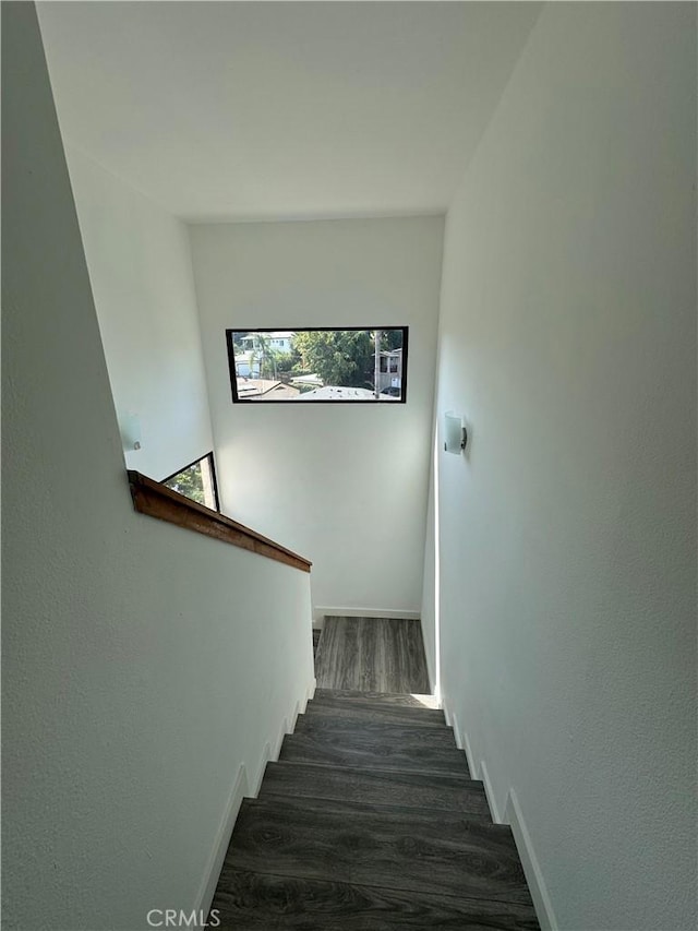 4812 E Seldner Ave, Los Angeles, CA 90032 - stairs with wood finished floors and baseboards