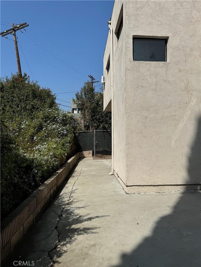 4812 E Seldner Ave, Los Angeles, CA 90032 - view of home's exterior featuring stucco siding and a patio