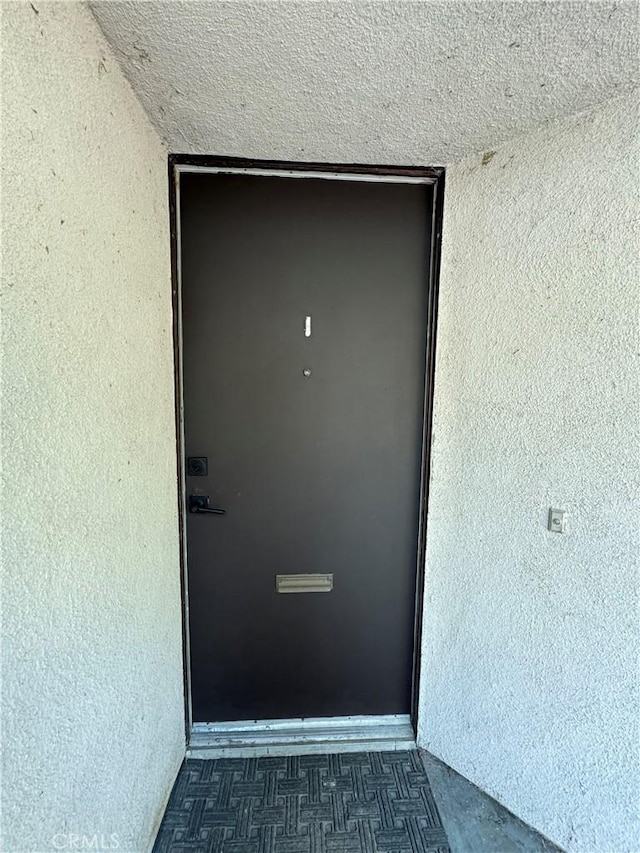 4812 E Seldner Ave, Los Angeles, CA 90032 - view of exterior entry featuring stucco siding