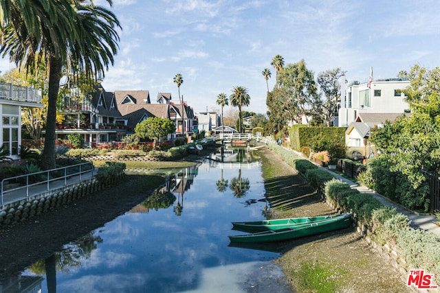 view of property's community with a water view