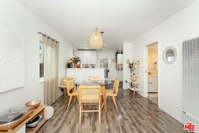 dining room featuring hardwood / wood-style flooring