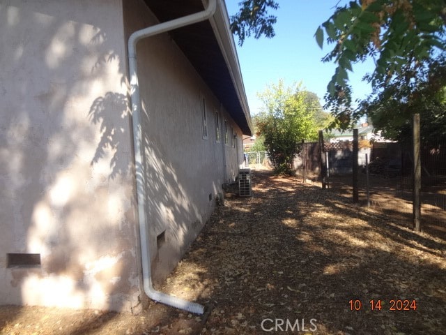 view of property exterior featuring central AC unit