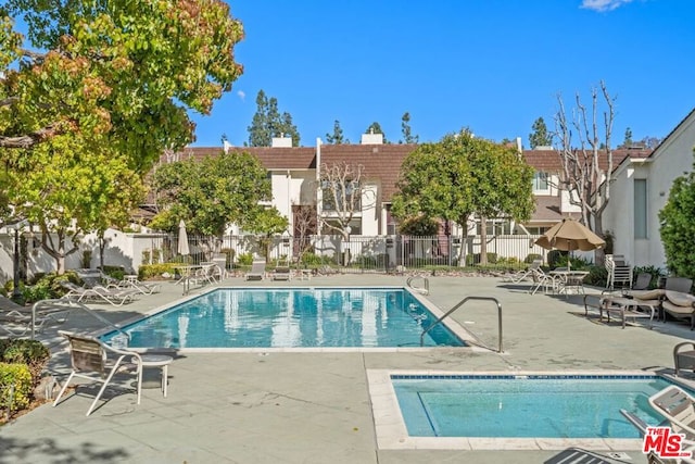 view of pool with a patio