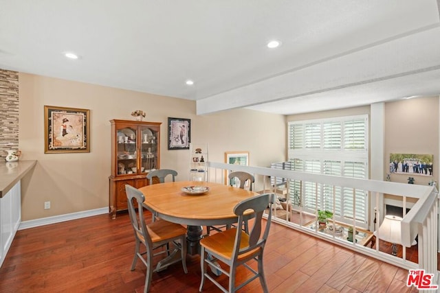 dining area with wood-type flooring